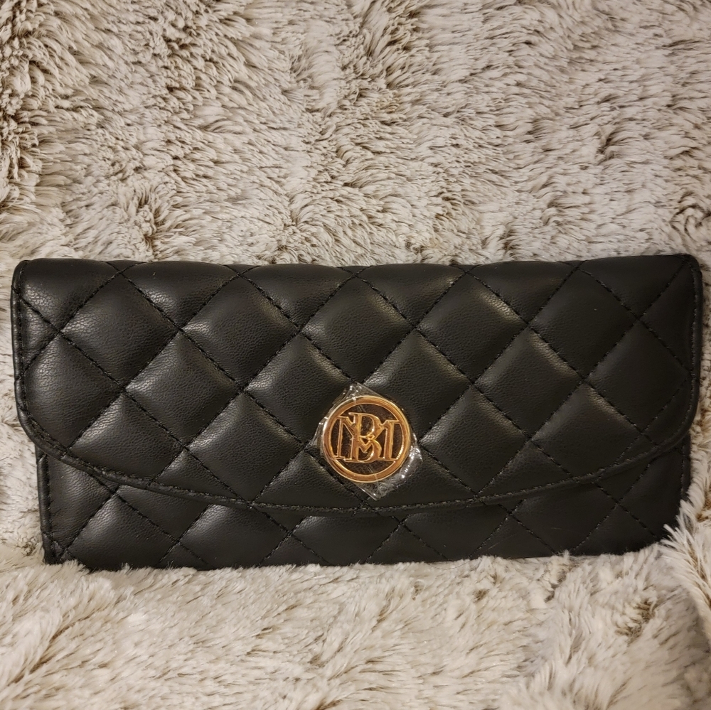 Badgley Mischka quilted black wallet.